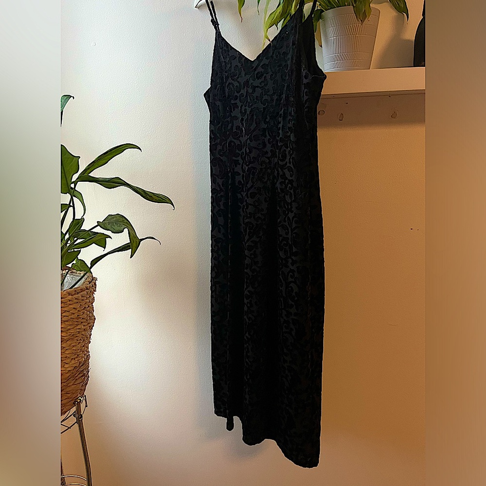 Black cheetah print form fitting dress